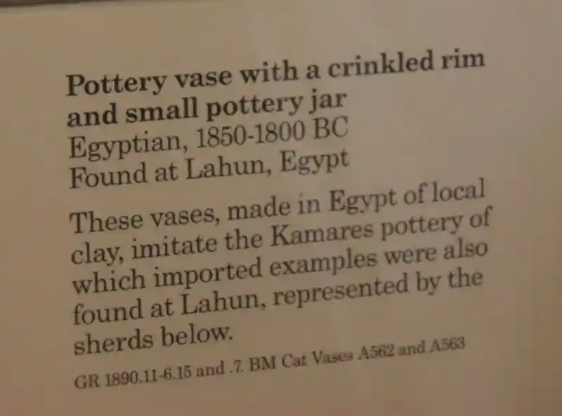 Cross and circles on a crinkled vase